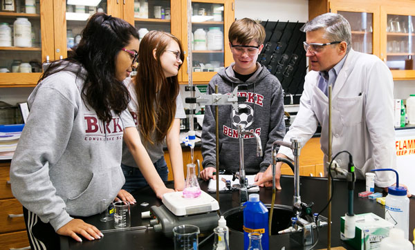 Teacher with students