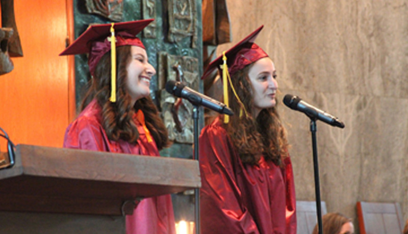 graduates on stage