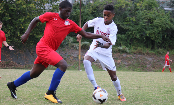 students playing soccer